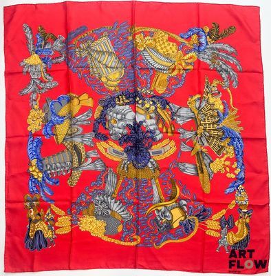 une image représentant un foulard en soie rouge orné du portrait d'un homme à cheval