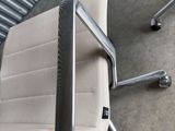 a chair that is sitting in front of a wall