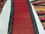 several rugs are laid out on the floor in a room
