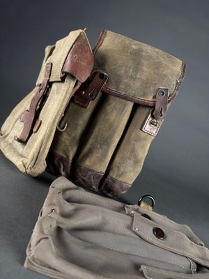 two bags that are sitting next to each other on a table