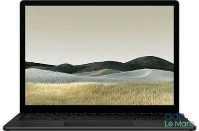 gros plan d'un ordinateur portable sur une surface blanche