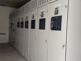 a room with a bunch of electrical equipment in it