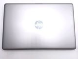 a laptop that is sitting on a white table