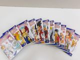 seven dragon ball cards are stacked on top of each other on a table
