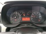 a close up of a car dashboard with a speedometer