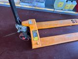 a fork lifter sitting on the floor in a store