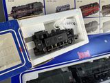 a box with a model train in it sitting on a table