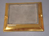 a picture of a gold picture frame on a table
