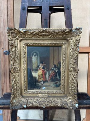 une photo d'un tableau posé sur un chevalet dans une pièce