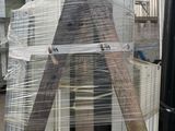 a picture of a pile of boxes wrapped in plastic