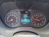a close up of a car dashboard with various gauges