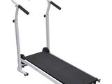 la machine à courir est posée sur une surface blanche