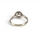 a close up of a ring on a white surface