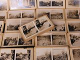many old black and white photos on the table
