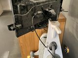 an old television sitting on a stand in a room