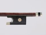 a close up of a violin bow on a white background