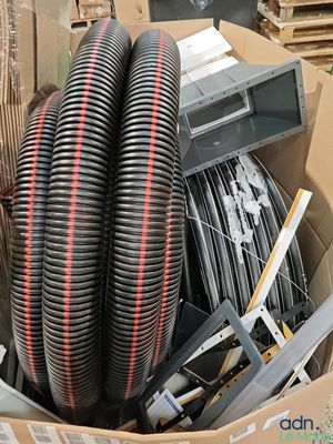a box full of different types of hoses in it