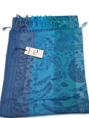 a close up of a blue scarf with a tag on it