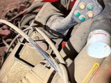 a pile of assorted items sitting on the ground