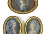 three framed portraits of a woman and a man in a blue dress