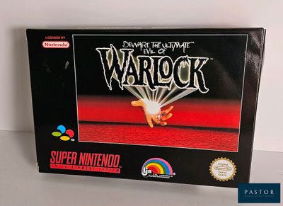 La boîte du jeu Nintendo « Warlock » est posée sur une table.