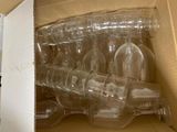 a lot of empty wine glasses in a box