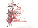 a red and black drawing on a white book