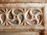 a picture of a stone carving on the wall of a building