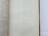 an open book on a white table with a white background