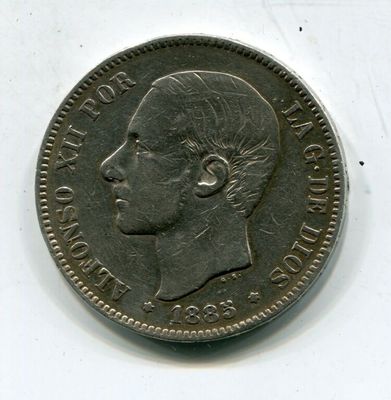 une vieille pièce britannique sur laquelle figure la tête d'un homme