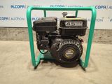 an image of a small engine on a stand
