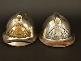 two helmets that are sitting next to each other