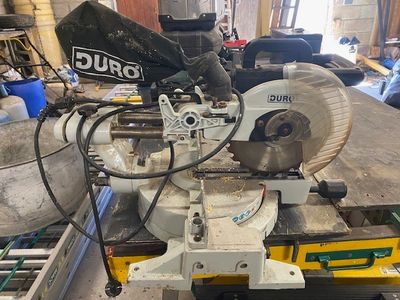 a machine that is sitting on a table in a garage