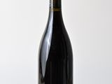 a bottle of wine that is sitting on a table