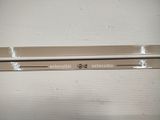 two pencils that are sitting on top of a box