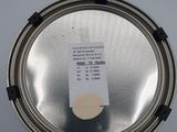 a picture of a metal pan with a sticker on it
