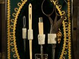 a picture of a case with a pair of scissors and a pair of scissors in it