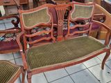 a lot of chairs and a table in a room