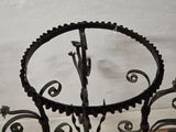 a table with a clock on top of it in a room