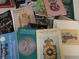 a lot of books that are sitting on a table