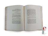 an open book that is sitting on a table