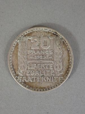 an old coin that is sitting on a table