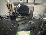 a machine that is sitting on a counter in a kitchen