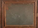 a picture of an old wooden frame with a chalkboard
