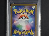 a close up of a pokemon card on a black surface