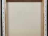 a black and white picture frame sitting on top of a table