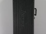 a black suitcase that is sitting on a table