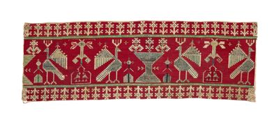 un gros plan d'un tapis rouge et vert sur fond blanc