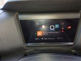 a car dashboard with a digital display on it