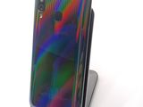 an image of a close up of a cell phone on a stand
